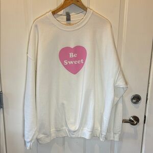 White Sweatshirt with Pink Heart Graphic